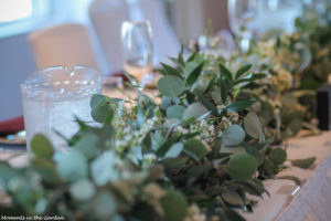 Eucalyptus boughs with waxed flowers interspersed-7183