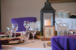 Simple table setting using moss at base of lantern-7170